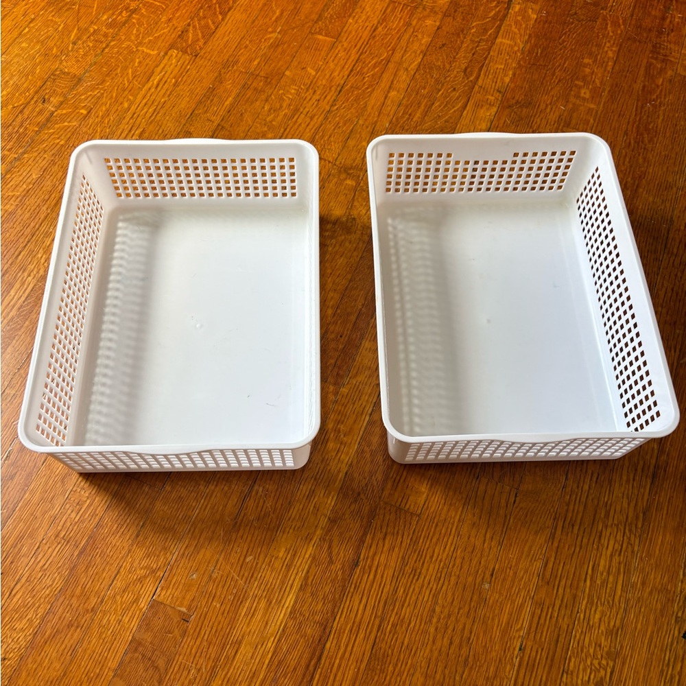 2 White Plastic Basket Storage Bins